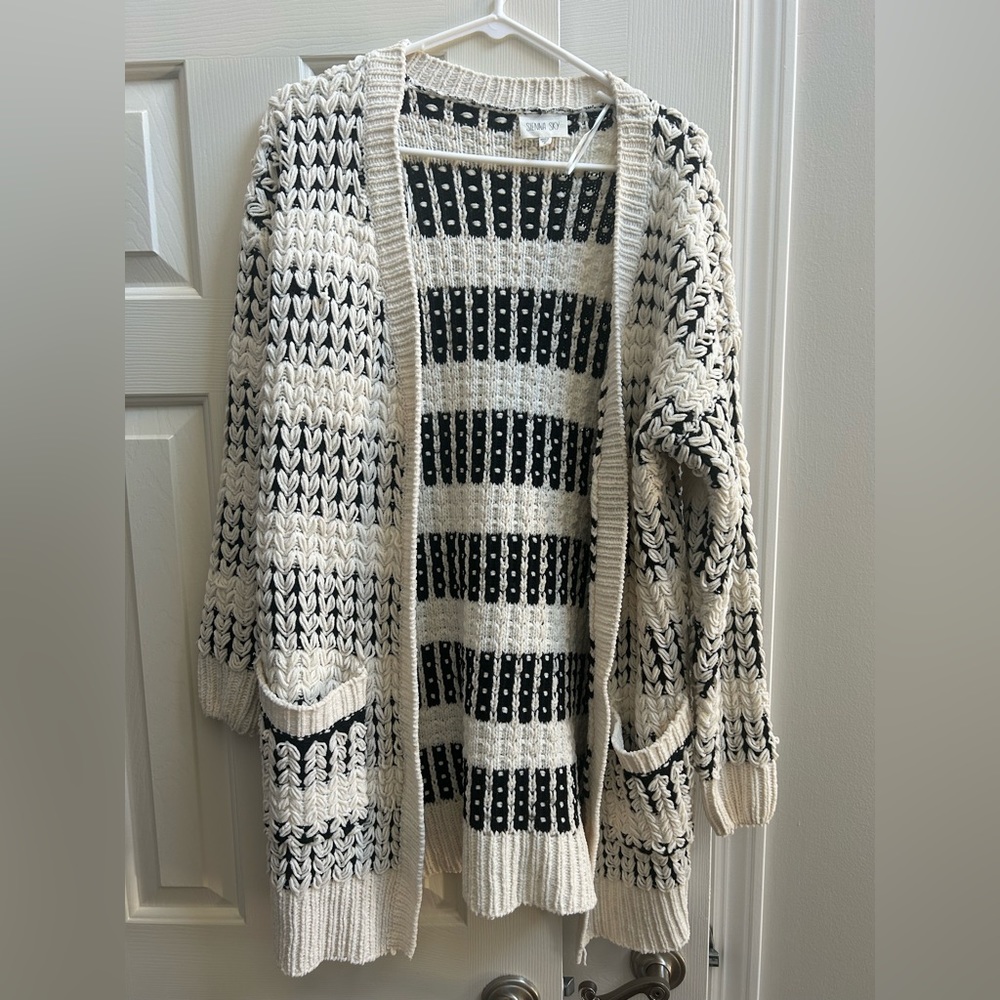 Cream and black cardigan M